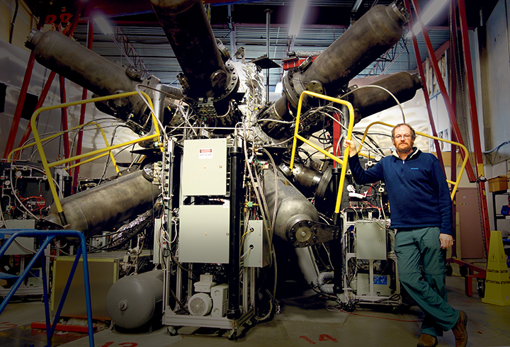 Michel Laberge standing in front of Fusion Reactor
